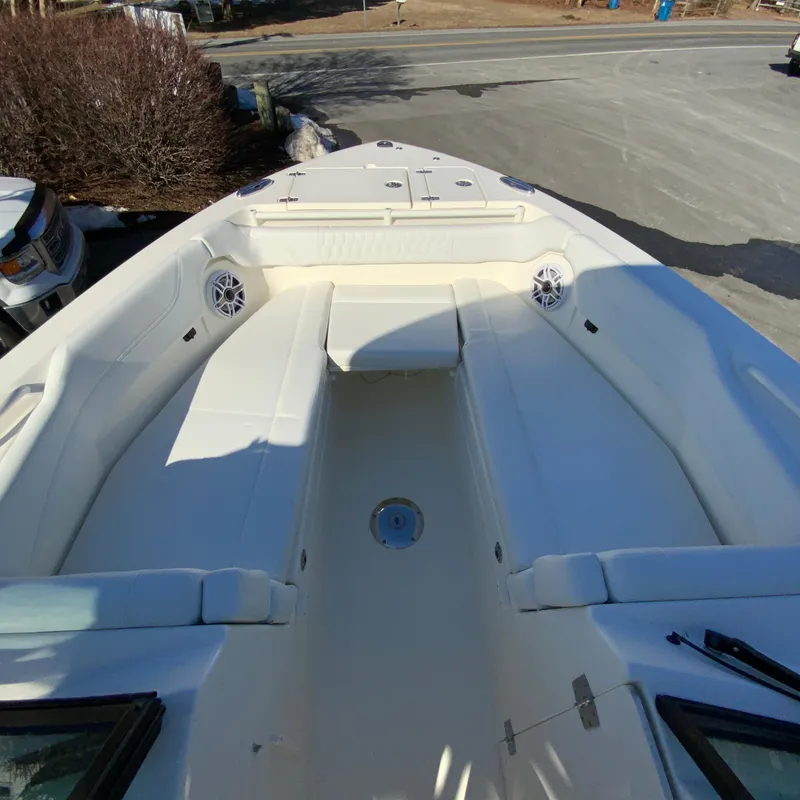 Slide: The Image of 2025 Cobia 280 Dual Console boat interior with spacious seating and modern design. - 34