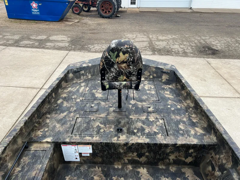 Slide: The Image of 2024 Lund 1870 Predator SC boat with camouflage interior, front view. - 8