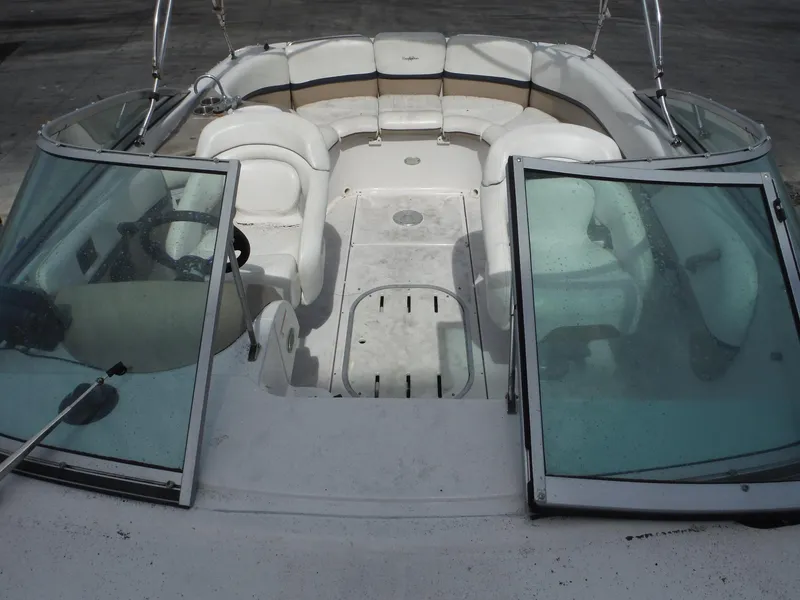 Slide: The Image of 2006 Four Winns 255 Sundowner boat interior with open windshield and seating area. - 20