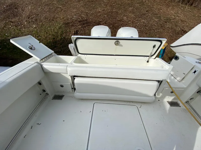 Slide: The Image of 2007 Hydra-Sports 2900VX boat interior with open storage compartments. - 10