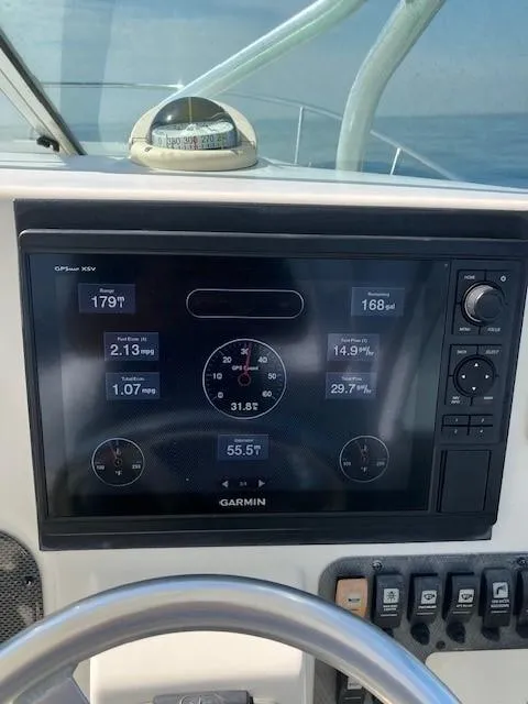 Slide: The Image of 2007 Hydra-Sports 2900VX boat dashboard with Garmin navigation system. - 14