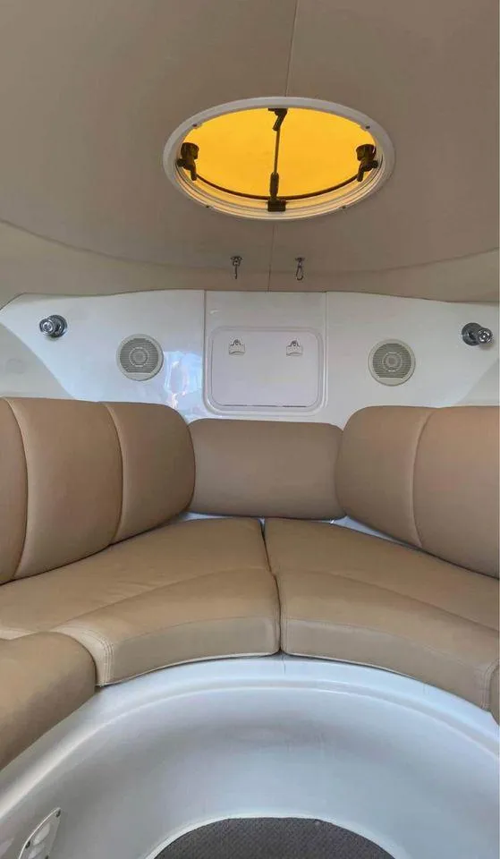 Slide: The Image of Interior cabin of a 2007 Hydra-Sports 2900VX boat with beige seating. - 18