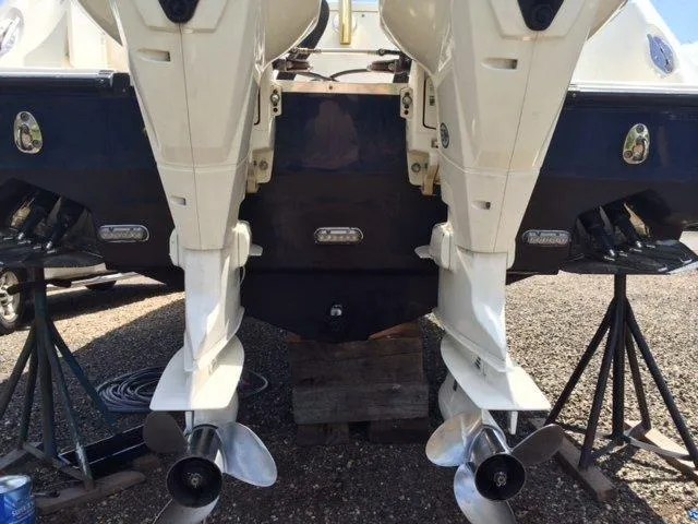 Slide: The Image of 2007 Hydra-Sports 2900VX boat with dual outboard motors on stands. - 25