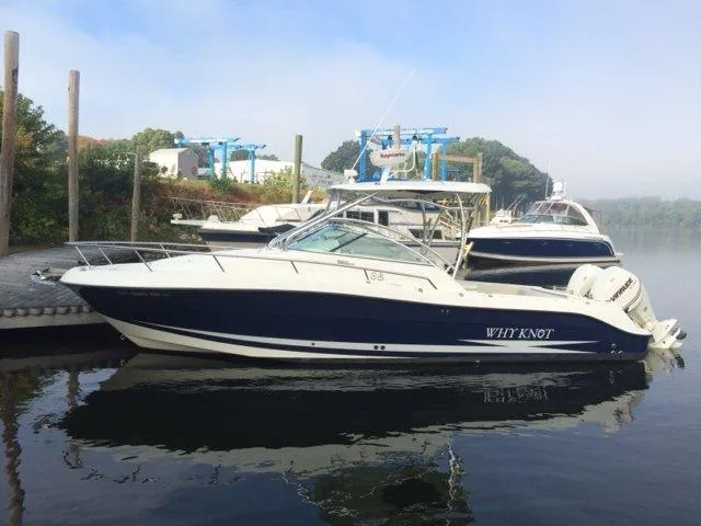 Slide: The Image of 2007 Hydra-Sports 2900VX boat docked at marina, named WHY KNOT. - 3
