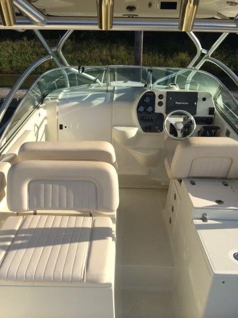 Slide: The Image of 2007 Hydra-Sports 2900VX boat interior with helm and seating. - 7