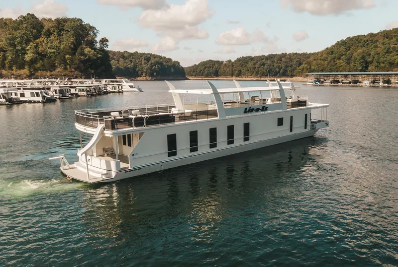 Slide: The Image of Luxury houseboat Sharpe 20 x 100, 2007 model, cruising on a scenic lake. - 10