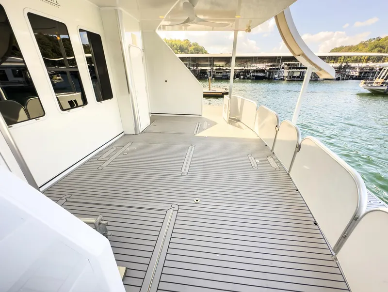 Slide: The Image of Spacious deck of 2007 Sharpe 20 x 100 houseboat docked at marina. - 16