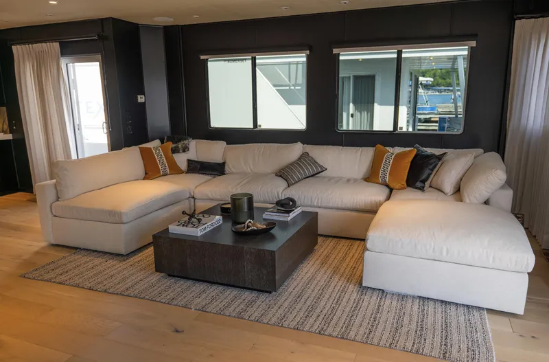 Slide: The Image of Luxurious living room in a 2007 Sharpe 20 x 100 houseboat with a large sectional sofa. - 18