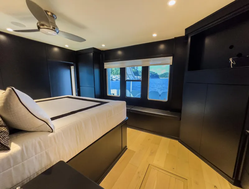 Slide: The Image of Modern bedroom interior on a 2007 Sharpe 20 x 100 houseboat with lake view. - 27