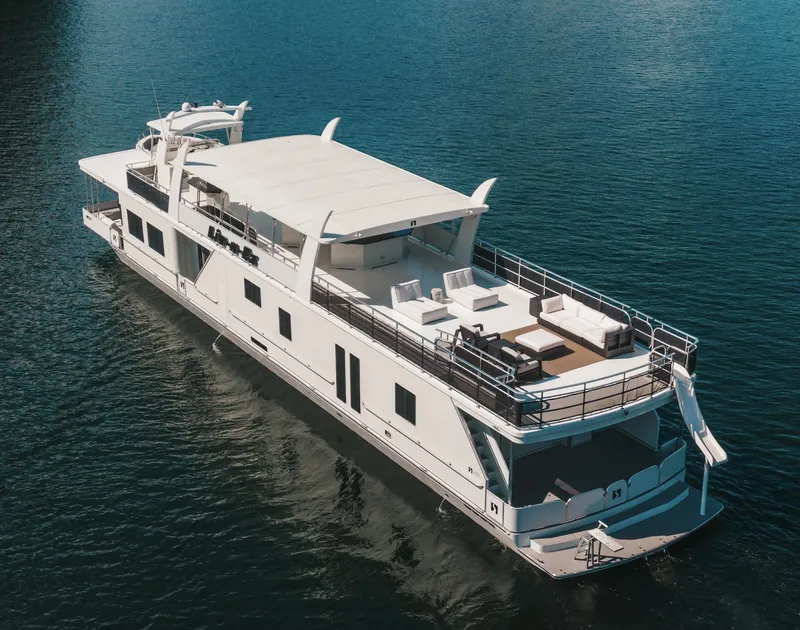 Slide: The Image of Luxurious 2007 Sharpe 20 x 100 houseboat on serene water. - 3