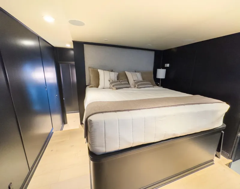 Slide: The Image of Luxurious bedroom in a 2007 Sharpe 20 x 100 houseboat with modern decor. - 38