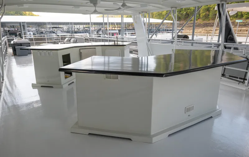 Slide: The Image of Upper deck of 2007 Sharpe 20 x 100 houseboat with bar and seating area. - 43