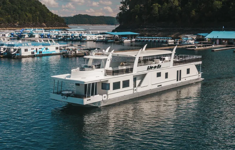 Slide: The Image of Luxury houseboat Sharpe 20 x 100, 2007 model, cruising on a scenic lake. - 9