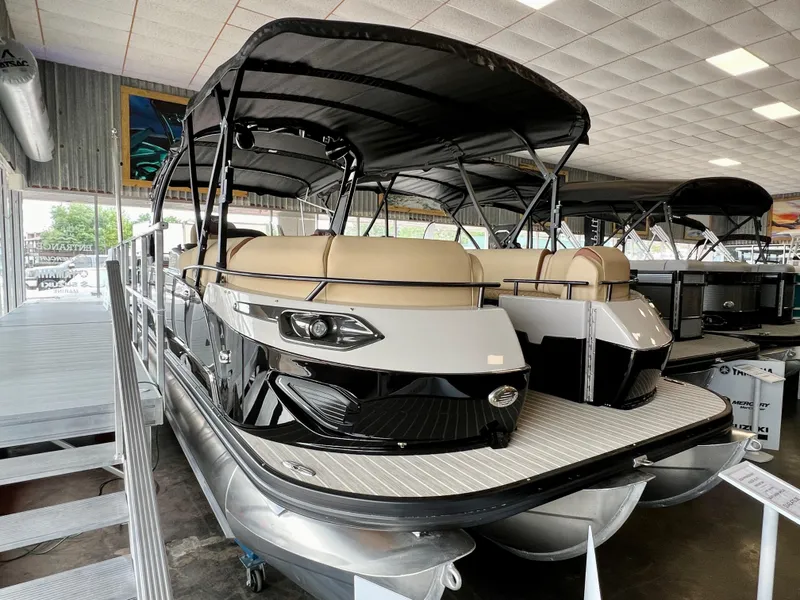The Image of 2024 Princecraft Vogue 25 XT pontoon boat in showroom. - 0