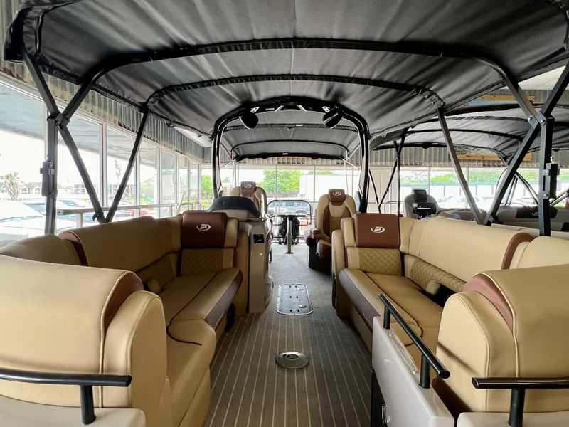 Slide: The Image of 2024 Princecraft Vogue 25 XT pontoon boat interior with luxurious seating. - 10