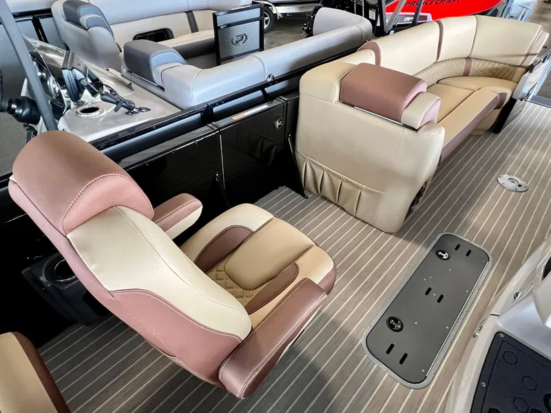 Slide: The Image of 2024 Princecraft Vogue 25 XT boat interior with luxurious seating and modern design. - 9
