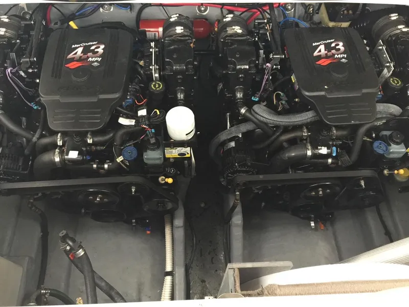 Slide: The Image of Twin MerCruiser 4.3 MPI engines in a 2004 Sea Ray 280 Sundancer boat. - 16