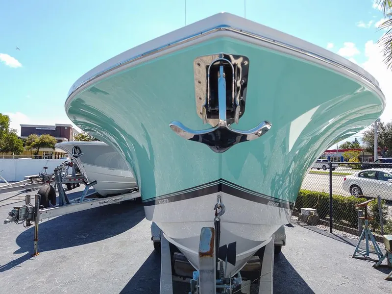 Slide: The Image of 2024 Regulator 28 boat on trailer, front view. - 1