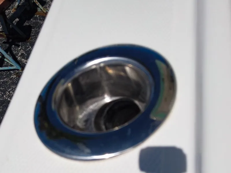 Slide: The Image of Close-up of a 2024 Regulator 28 boat's stainless steel cup holder. - 23