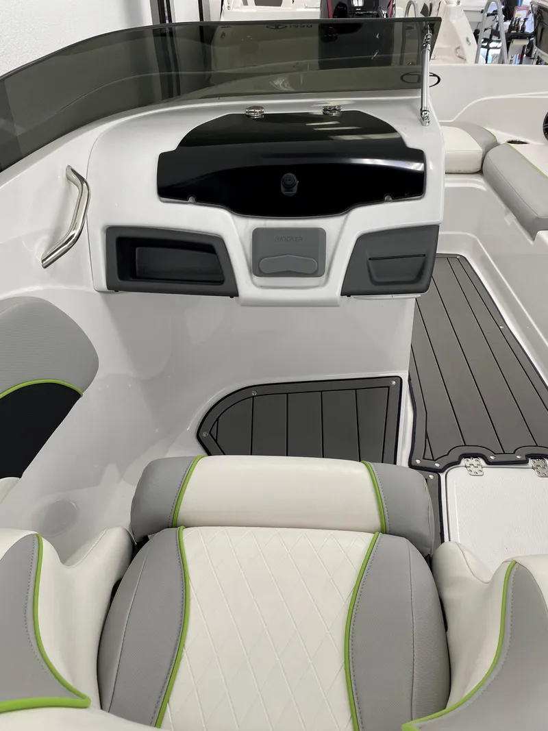 Slide: The Image of 2024 Tahoe 210 Si Limited boat interior with modern dashboard and seating. - 4
