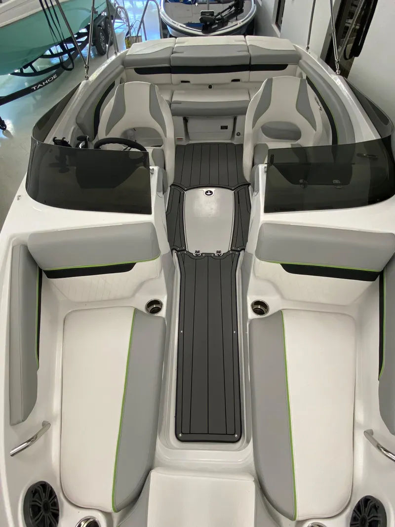Slide: The Image of 2024 Tahoe 210 Si Limited boat interior with sleek seating and modern design. - 5