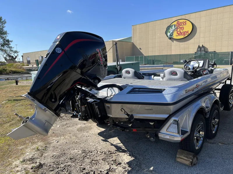 Slide: The Image of 2024 Ranger Z519 Ranger Cup Equipped boat outside Bass Pro Shops. - 3