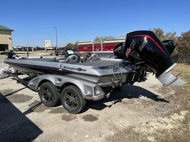 Slide: The Image of 2024 Ranger Z519 Ranger Cup Equipped boat with trailer in outdoor setting. - 4