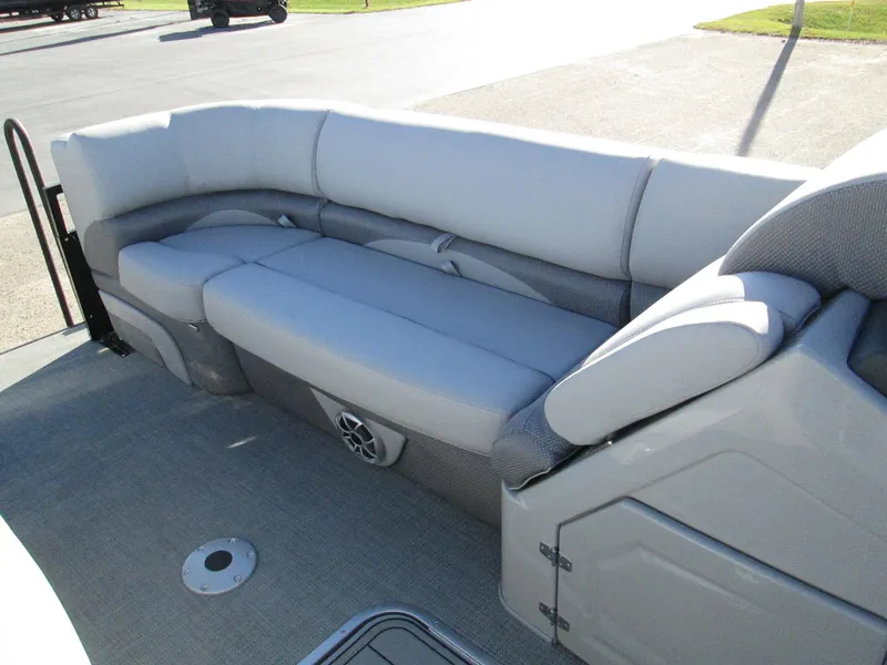 Slide: The Image of 2024 Regency 230 DL3 pontoon boat with spacious seating and modern design. - 17