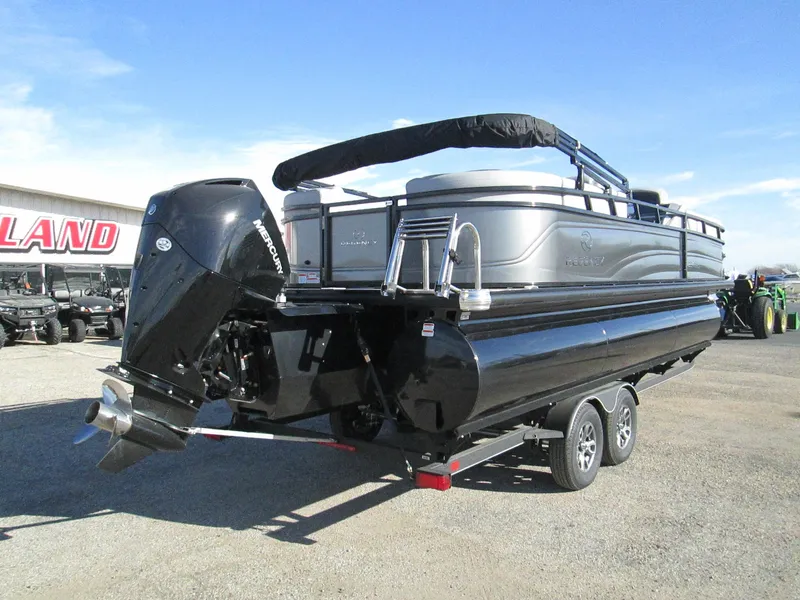 Slide: The Image of 2024 Regency 230 DL3 pontoon boat with outboard motor on trailer. - 6