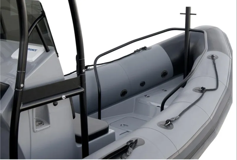 Slide: The Image of 2024 Inmar 670 Demo Boat, grey interior, spacious seating, modern design. - 9