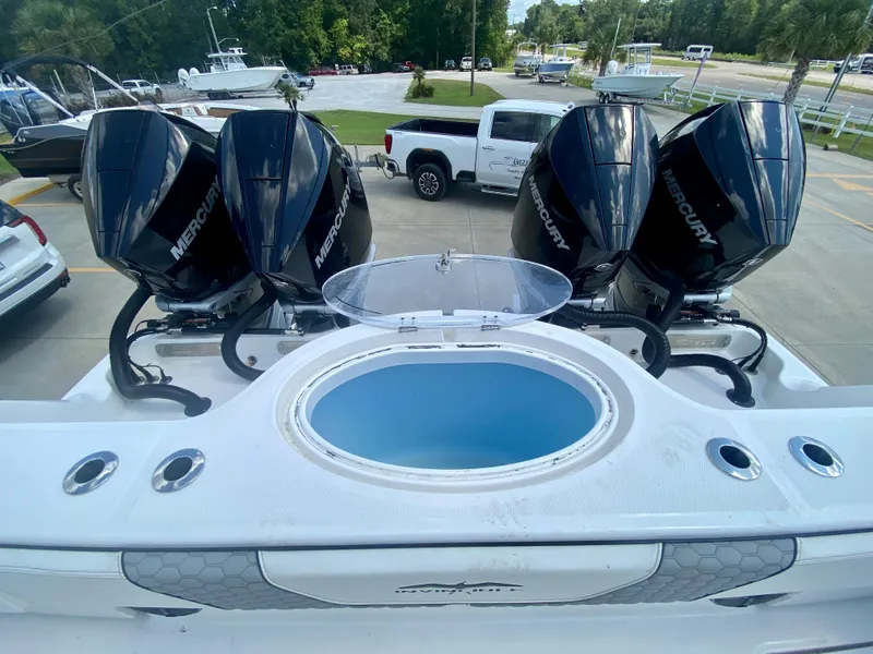 Slide: The Image of 2022 Invincible 35 Catamaran with quad Mercury outboard engines and livewell. - 6