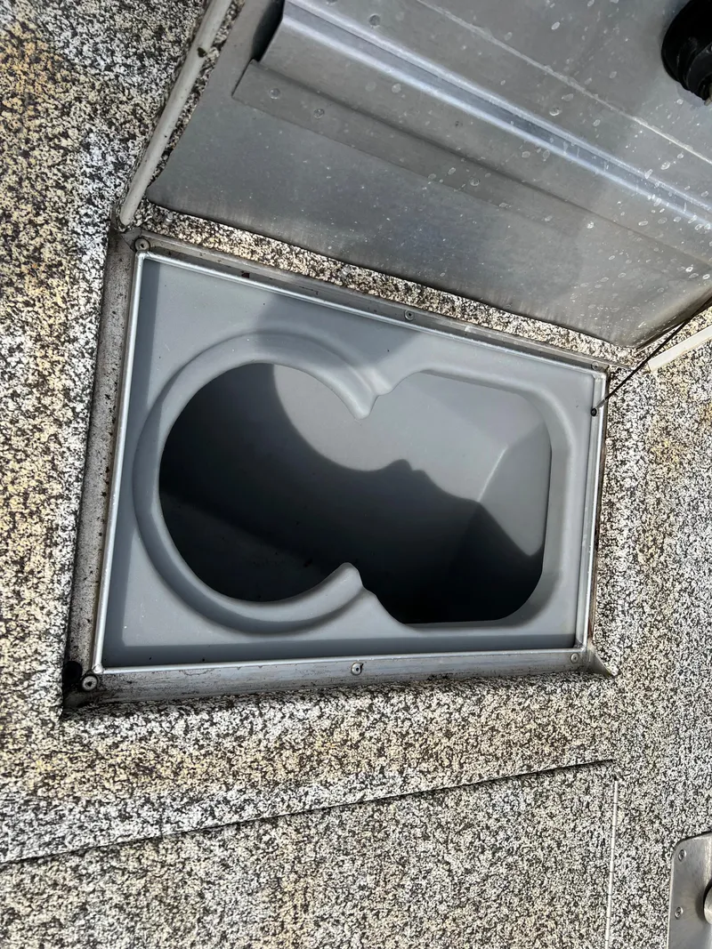 Slide: The Image of 2015 Tracker Pro Team 175 TXW boat storage compartment. - 12