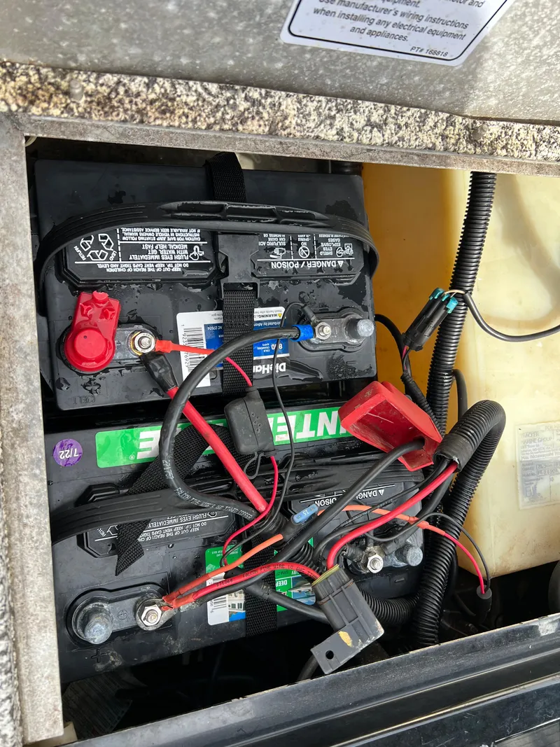 Slide: The Image of 2015 Tracker Pro Team 175 TXW boat battery compartment with wiring. - 15