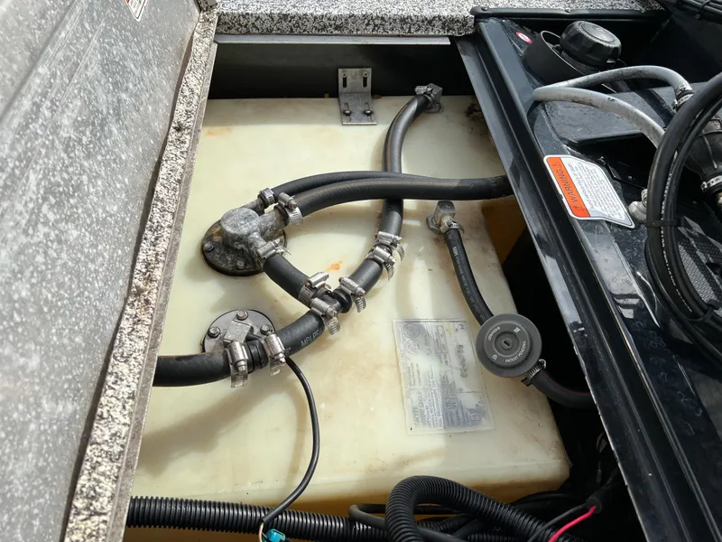 Slide: The Image of 2015 Tracker Pro Team 175 TXW fuel tank and hose connections. - 16