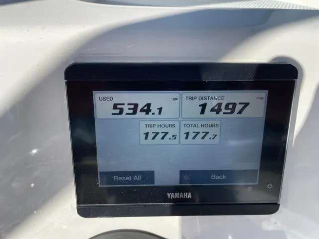 Slide: The Image of Yamaha display on 2022 Robalo 246 Cayman showing trip data and fuel usage. - 8