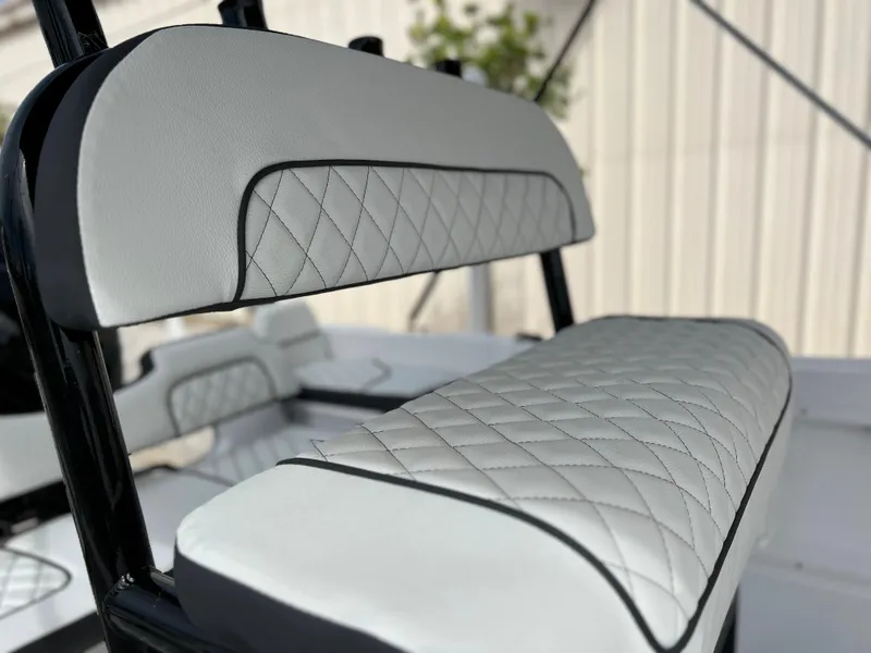 Slide: The Image of 2024 Clearwater 1900 boat with diamond-stitched upholstery. - 11