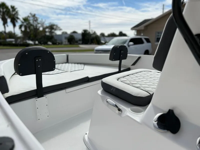 Slide: The Image of Clearwater 1900 boat interior, 2024 model, featuring cushioned seating and modern design. - 19