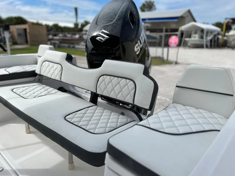 Slide: The Image of Clearwater 1900 2024 boat interior with Suzuki outboard motor. - 20