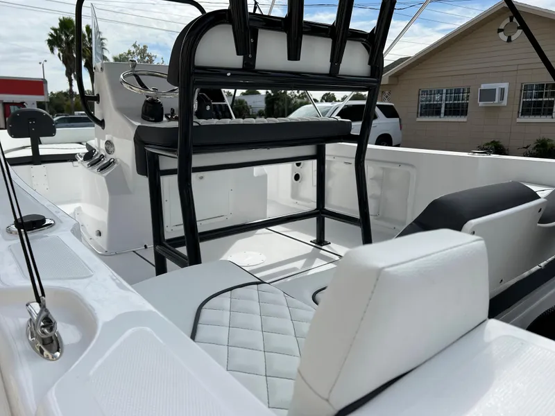 Slide: The Image of 2024 Clearwater 1900 boat interior with seating and console. - 21