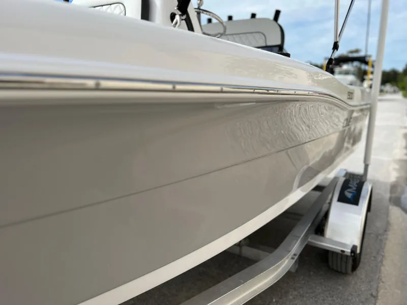 Slide: The Image of 2024 Clearwater 1900 boat on trailer, side view. - 22