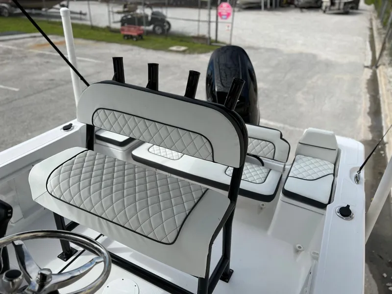 Slide: The Image of 2024 Clearwater 1900 boat with white quilted seats and black trim. - 28