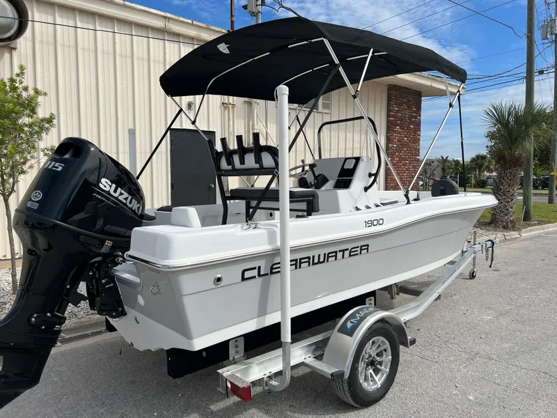 Slide: The Image of 2024 Clearwater 1900 boat with Suzuki outboard motor on trailer. - 7