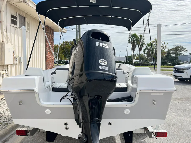 Slide: The Image of Clearwater 1900 boat 2024 model with 115 HP outboard motor, rear view. - 8