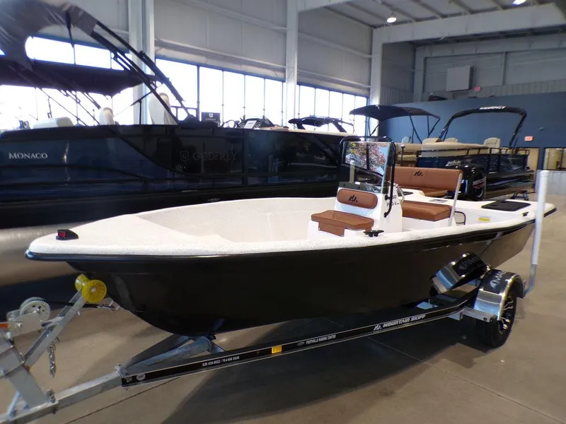 Slide: The Image of 2024 Skiff 160 PRO-Vee boat hatch with dual handles on textured surface. - 18