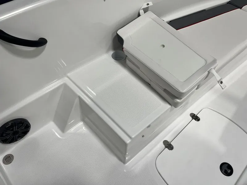 Slide: The Image of 2024 Tahoe T16 boat interior with storage compartments and seating. - 15