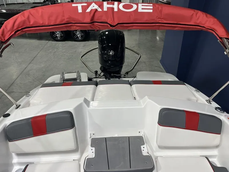 Slide: The Image of 2024 Tahoe T16 boat with red canopy and gray-red seating. - 27