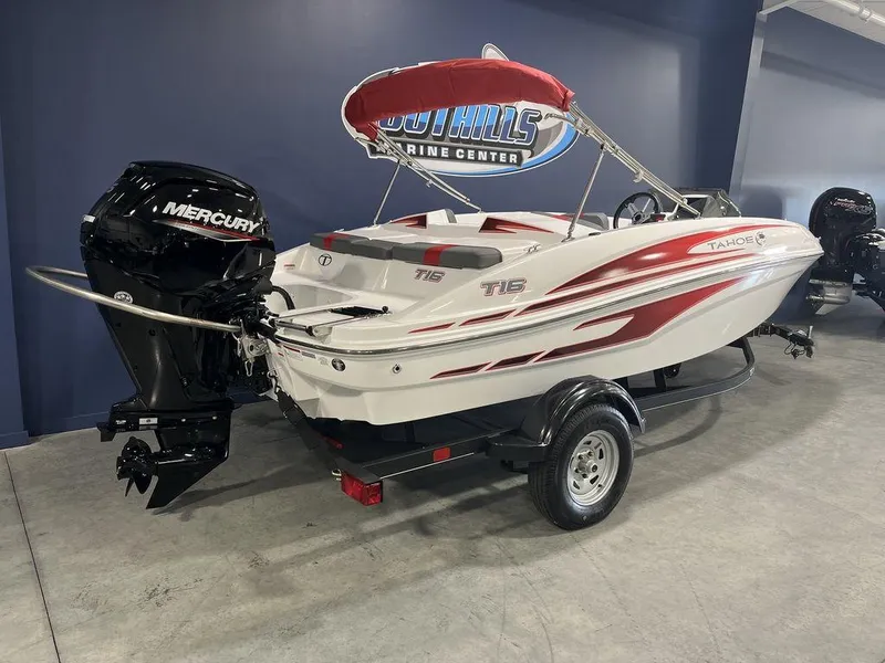 Slide: The Image of 2024 Tahoe T16 boat with Mercury outboard motor on trailer in showroom. - 5