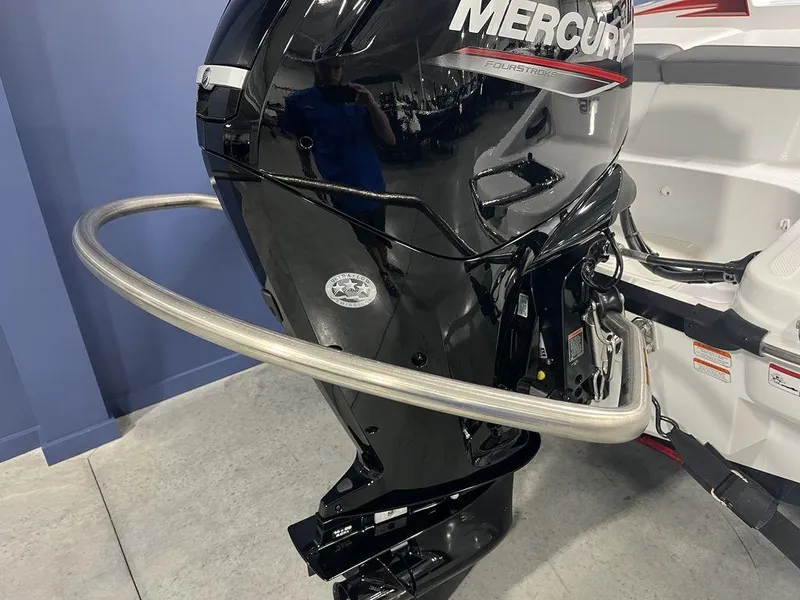 Slide: The Image of 2024 Tahoe T16 boat with Mercury outboard motor in showroom. - 6