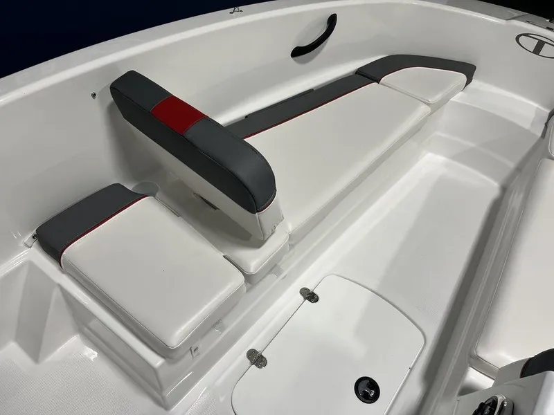 Slide: The Image of 2024 Tahoe T16 boat interior with white and gray seating. - 9