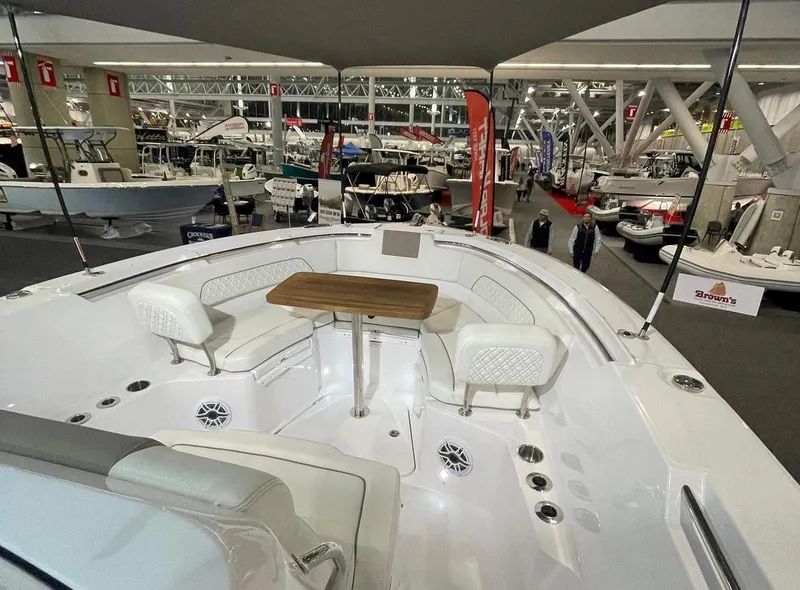 Slide: The Image of 2023 Bertram 28 CC boat interior at a boat show. - 3